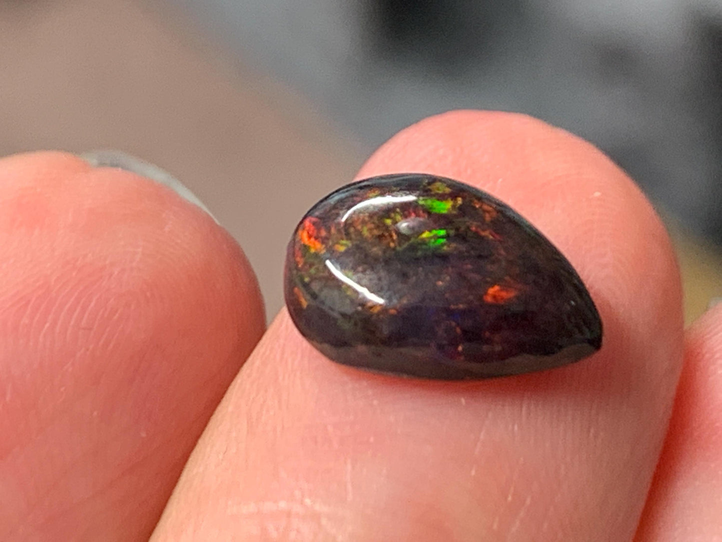 Natural Ethiopian Black Opal 8x11x4mm cabochon