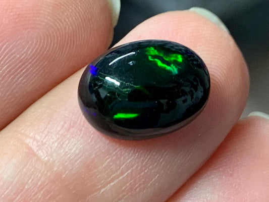 Natural Ethiopian Black Opal 9x12x6mm cabochon