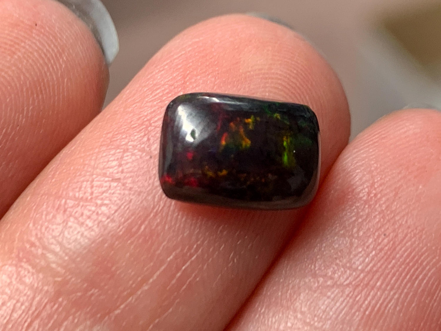 Natural Ethiopian Black Opal 6x9x3mm cabochon