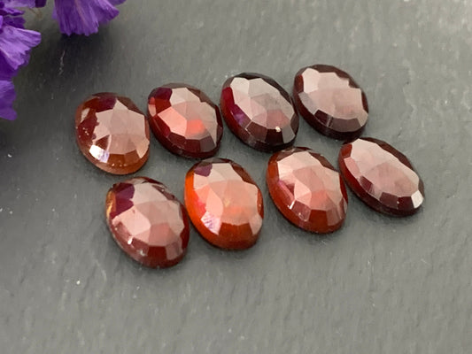 Faceted Hessonite Garnet oval 8x12mm cabochon
