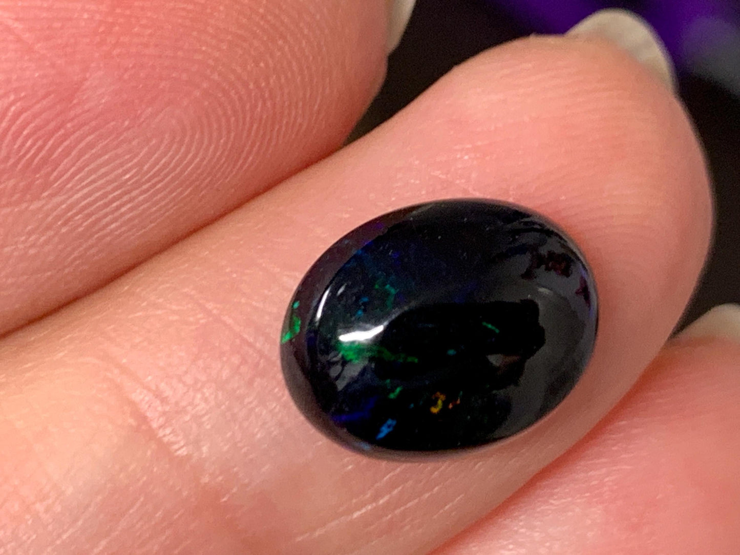 Natural Ethiopian Black Opal 9x11x4mm cabochon