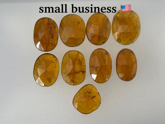 Faceted  Orange Kyanite oval 9-12mm long cabochon