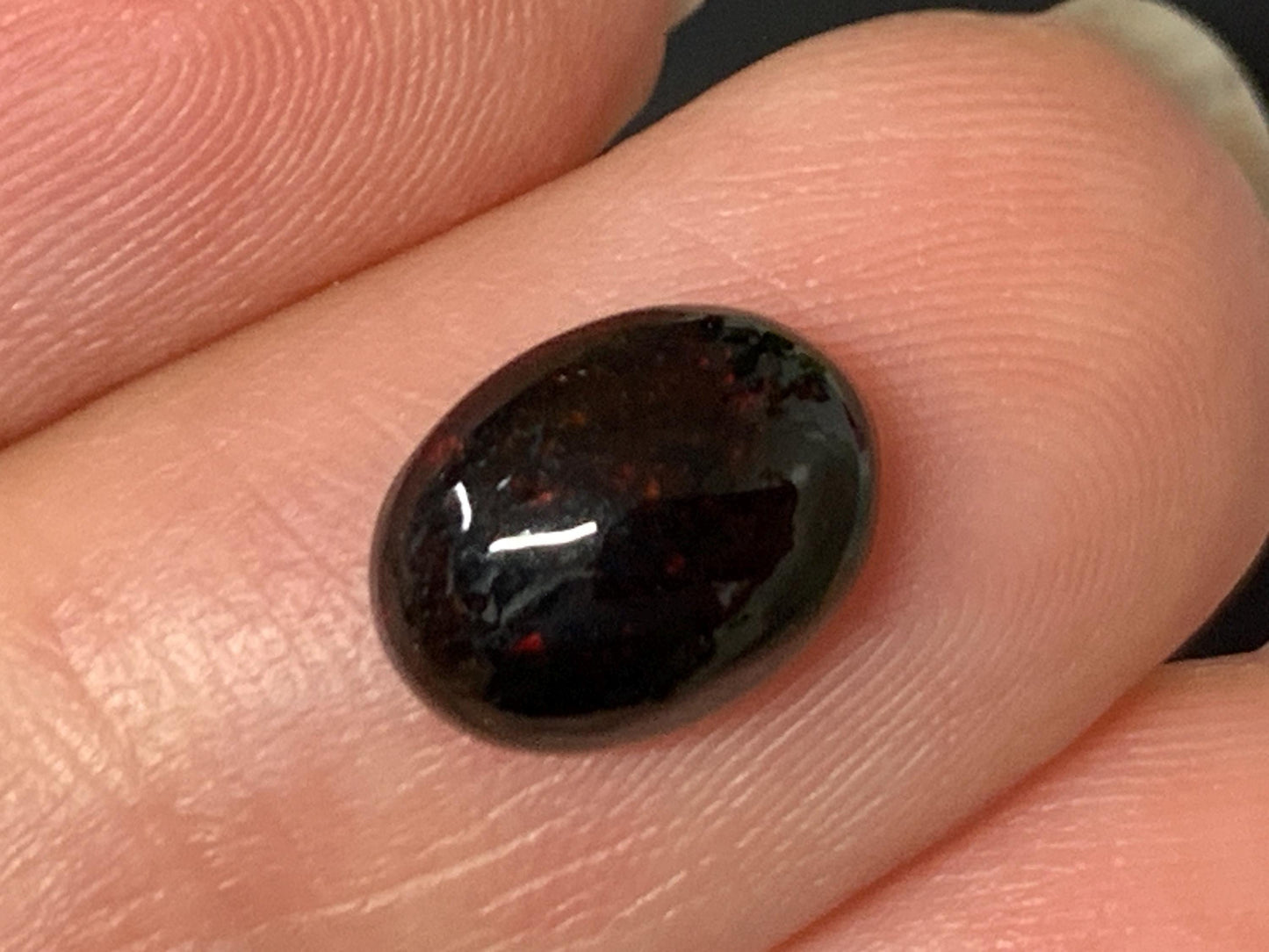 Natural Ethiopian Black Opal 7x9x4mm cabochon