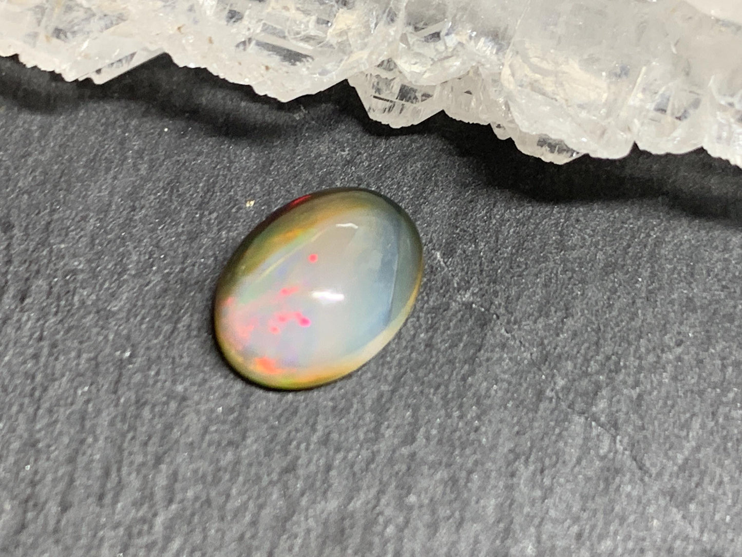 Natural Black Ethiopian Opal oval 7x10x4mm cabochon