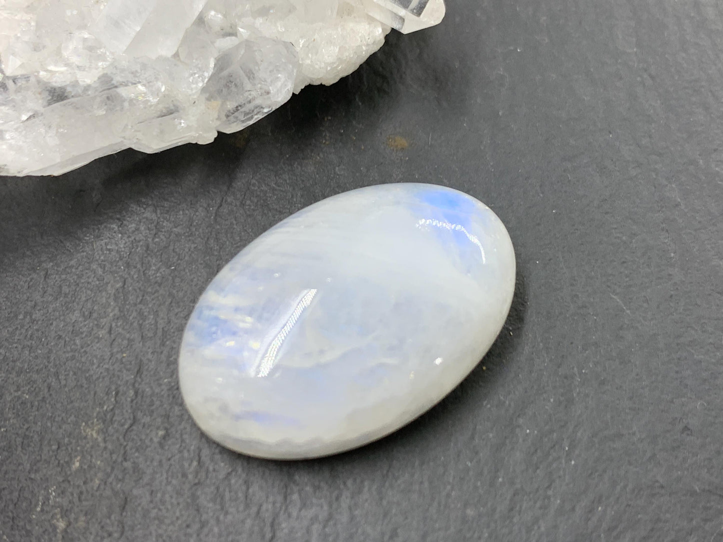 Rainbow Moonstone oval 24x16x9mm cabochon