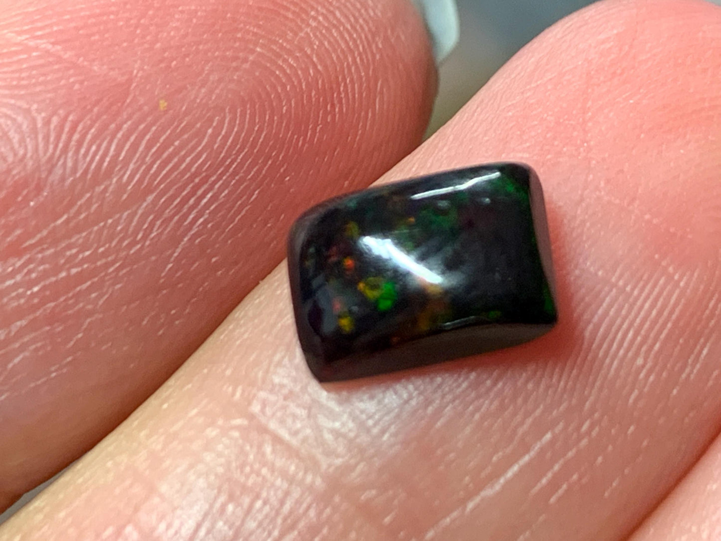 Natural Ethiopian Black Opal 6x8x3mm cabochon