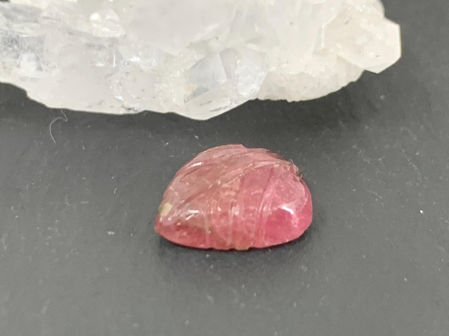 Carved Tourmaline 10x12x4mm cabochon