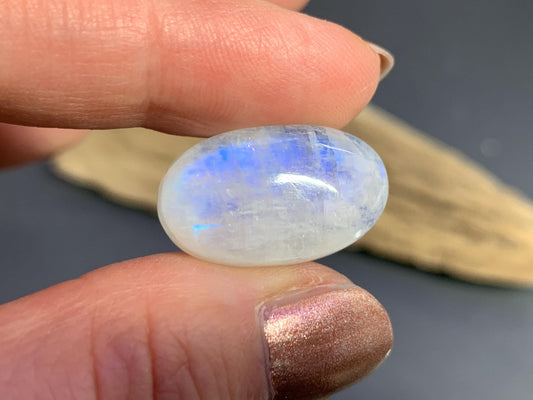 Rainbow Moonstone oval 30x18x7mm cabochon