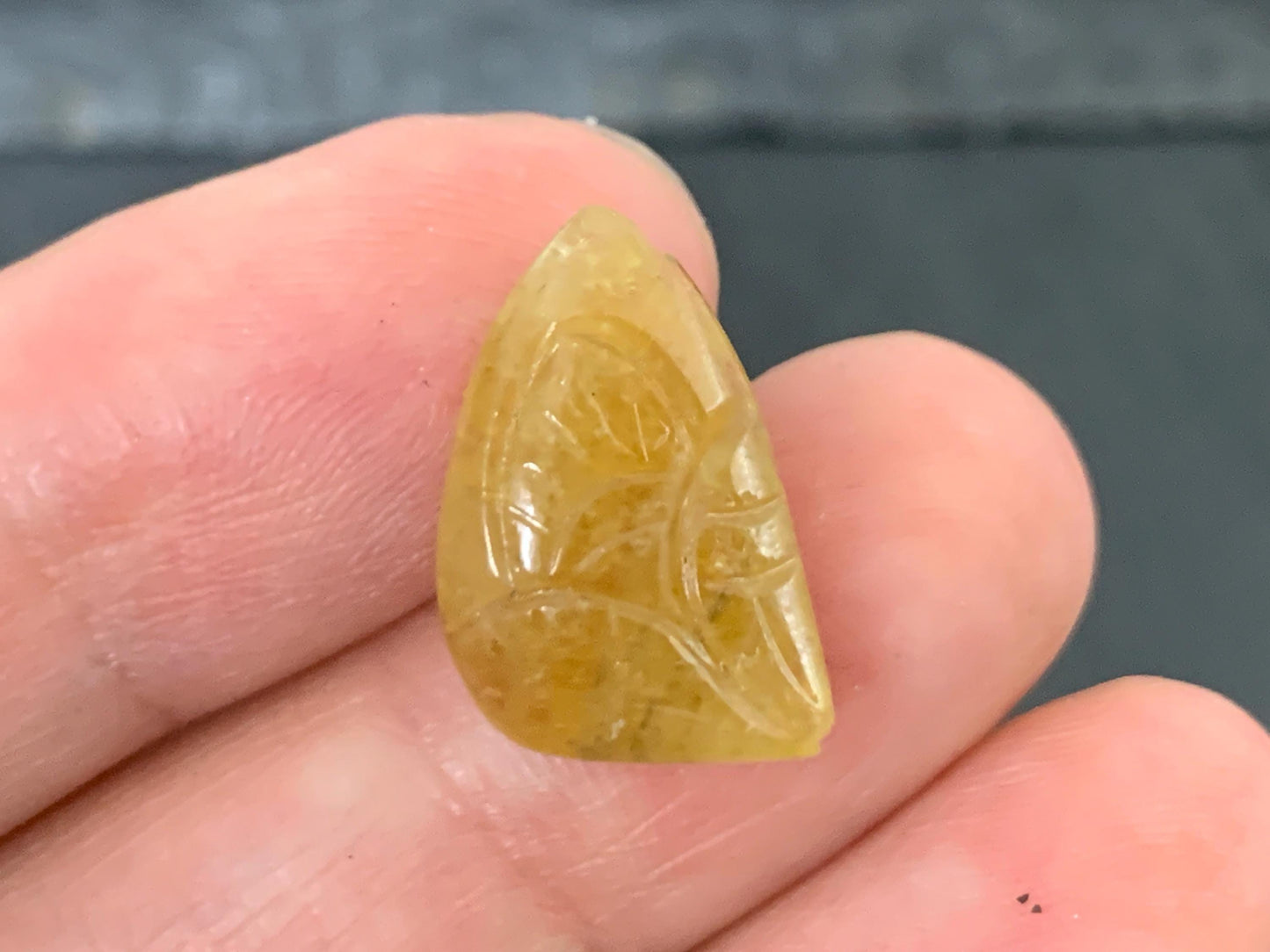 Carved Tourmaline 11x17x5.5mm cabochon