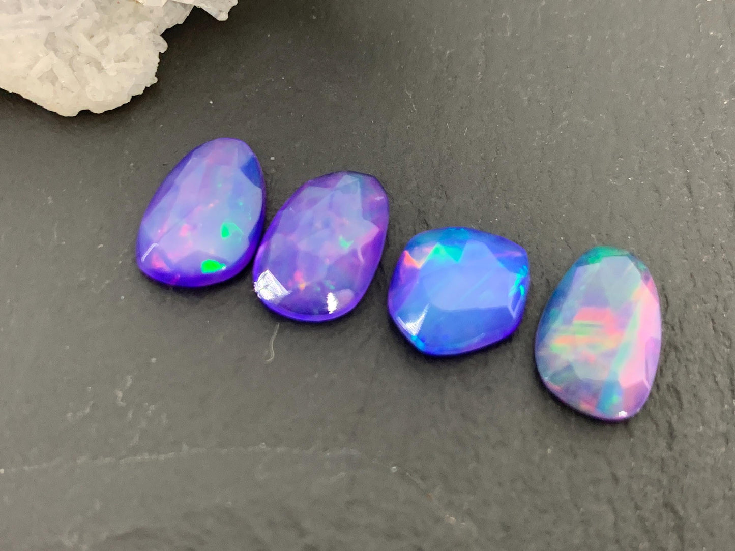 Faceted Ethiopian Purple Opal 9-11mm cabochon