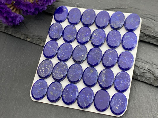 Flat Lapis Lazuli oval 10x14mm cabochon with facted edge - calibrated cabochons