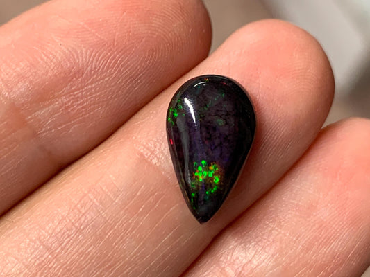 Black Ethiopian Opal pear 9x14x3mm cabochon