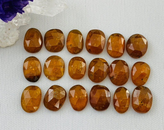 Faceted Orange Kyanite oval 9-10mm long cabochon