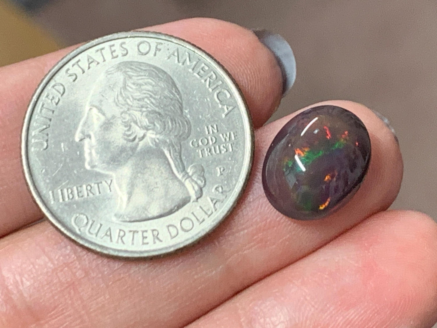 Natural Ethiopian Black Opal 10x13x5mm cabochon