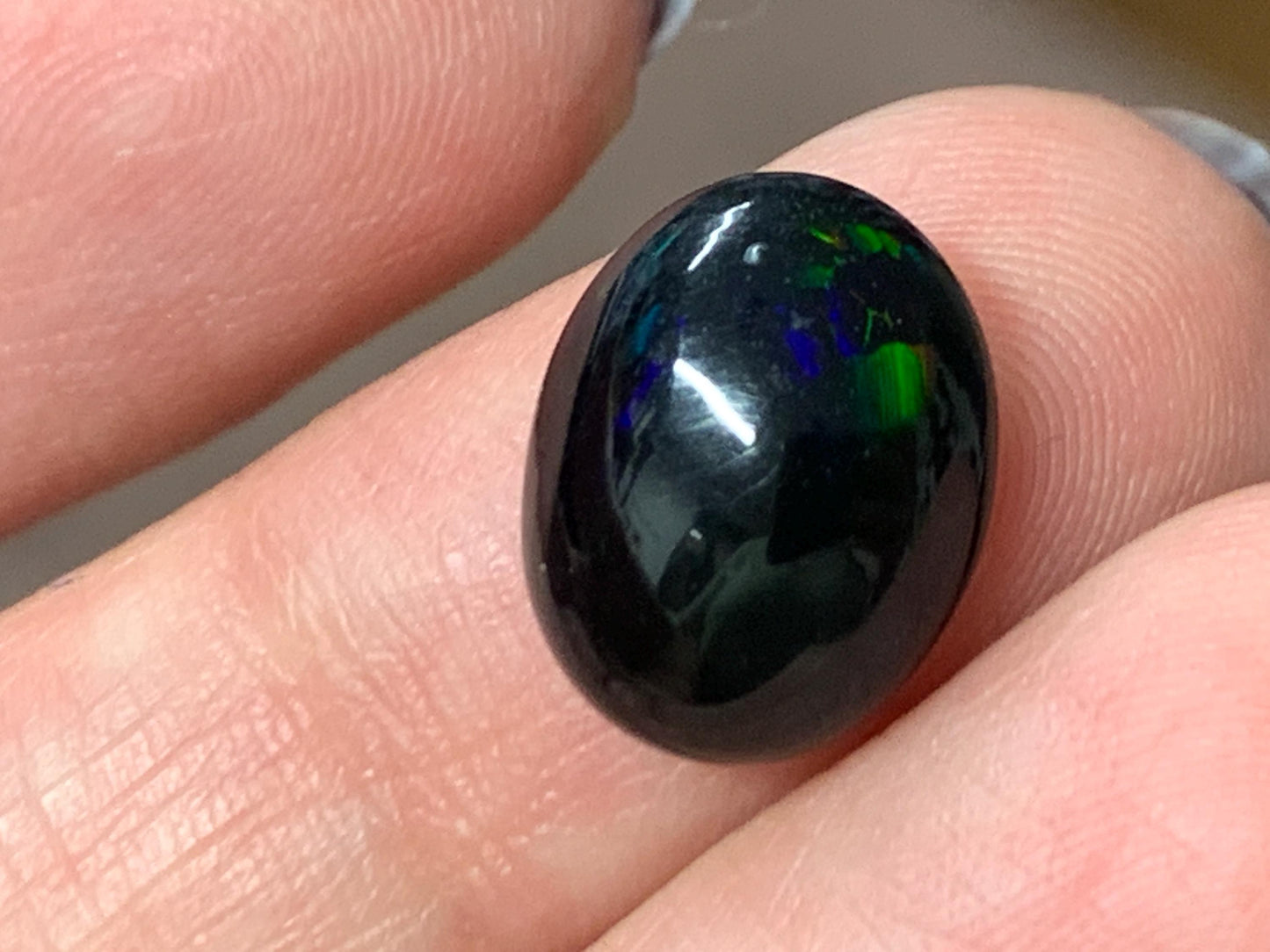 Natural Ethiopian Black Opal 10x12x5mm cabochon