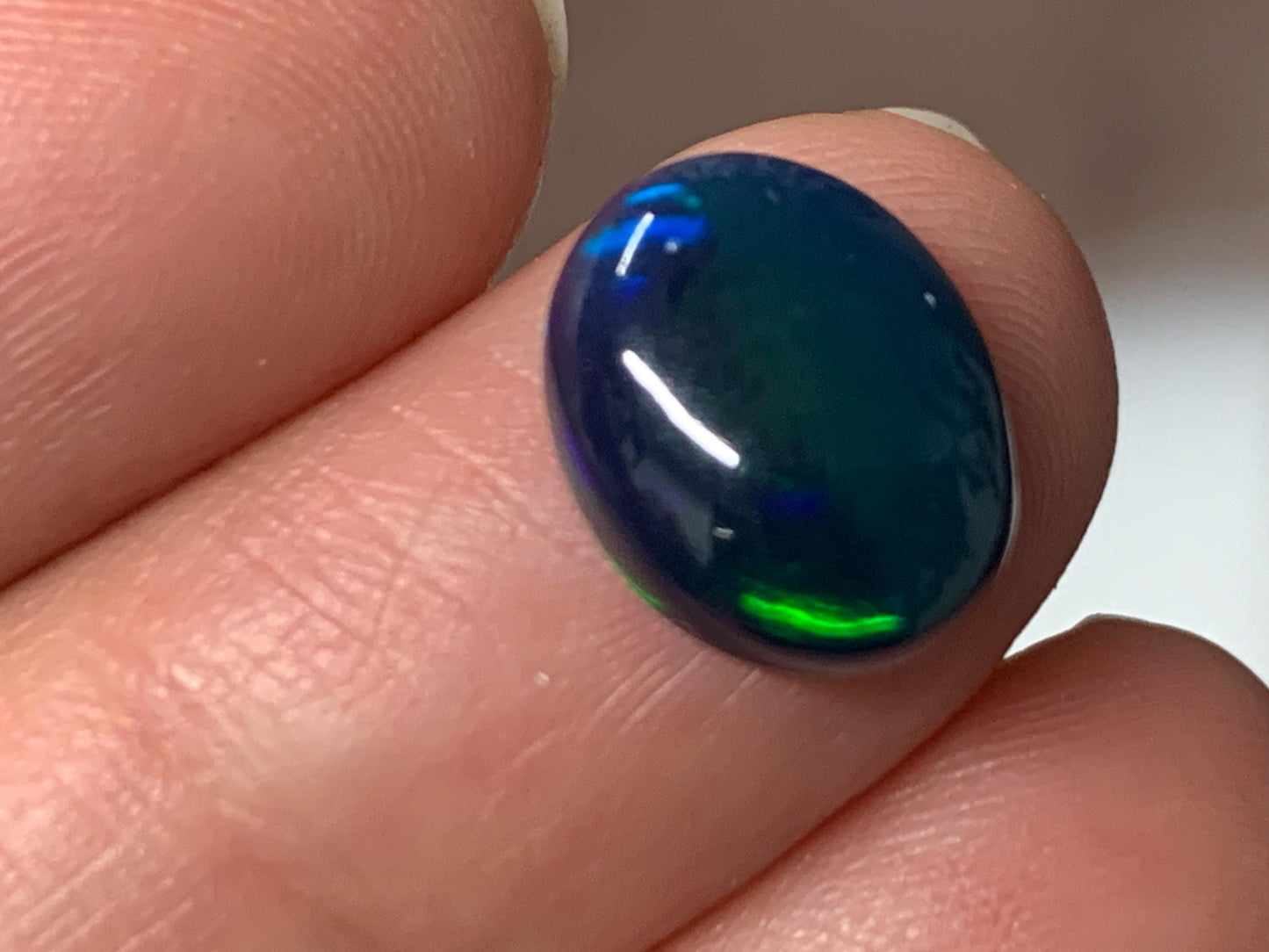 Natural Black Ethiopian Opal oval 9x11x4mm cabochon