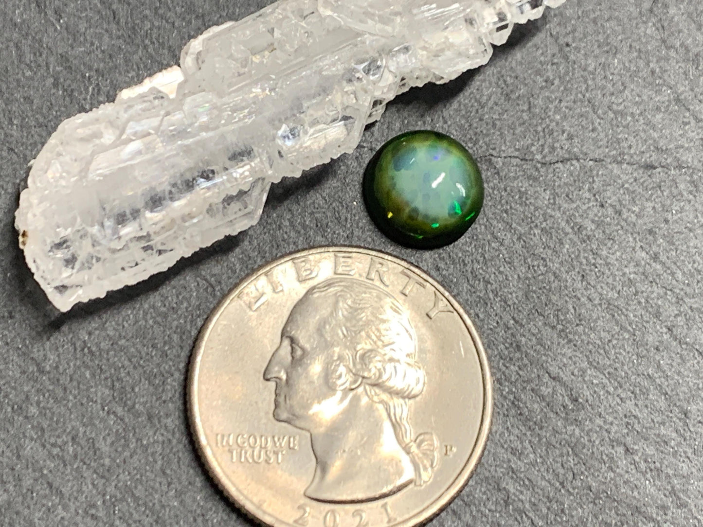 Natural Black Ethiopian Opal round 9.5x9.5x4mm cabochon