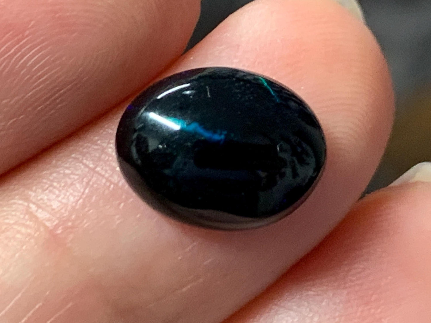 Natural Ethiopian Black Opal 9x12x5mm cabochon