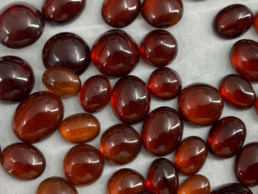Hessonite Garnet oval, round 7-11mm long cabochon