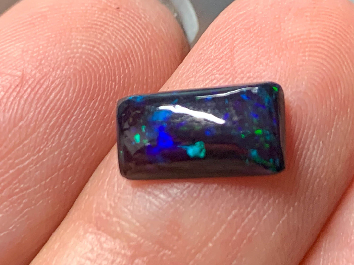 Natural Ethiopian Black Opal 6x11x3mm cabochon