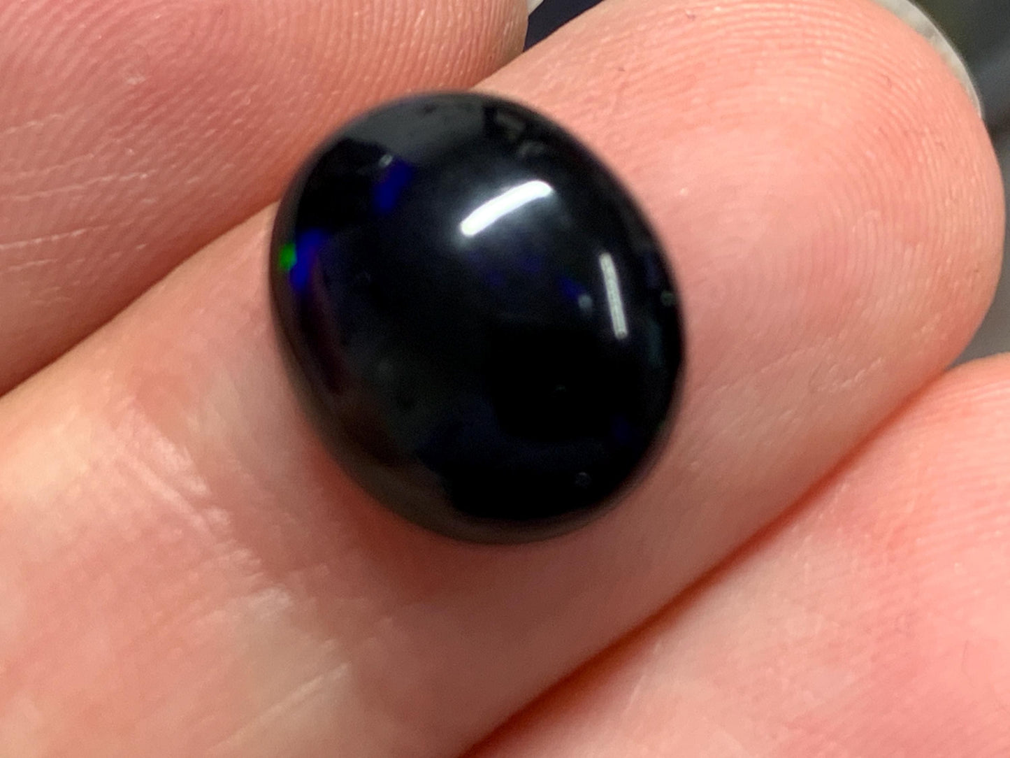 Natural Ethiopian Black Opal 10x12x5mm cabochon
