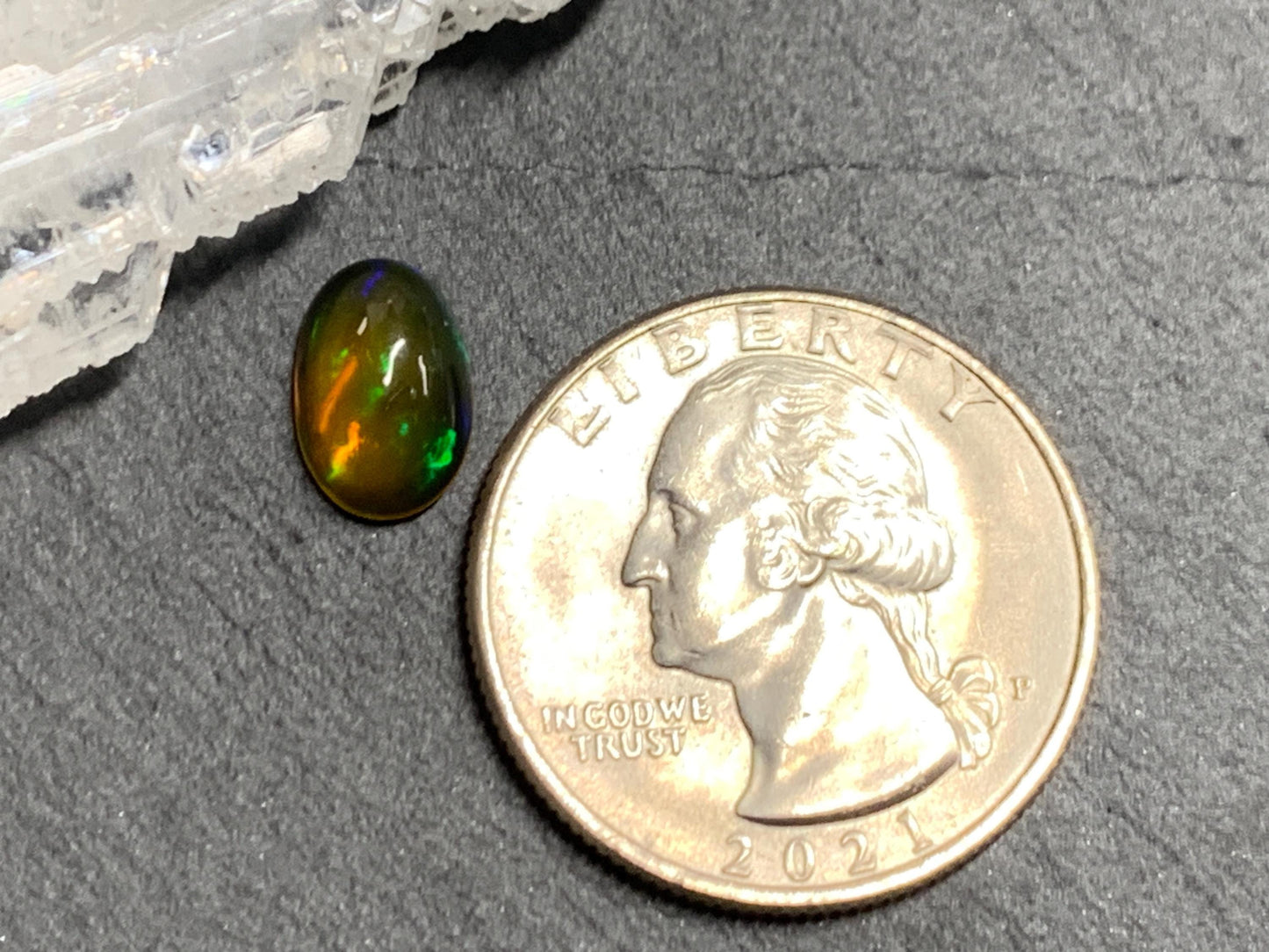 Natural Black Ethiopian Opal oval 6x10x4mm cabochon