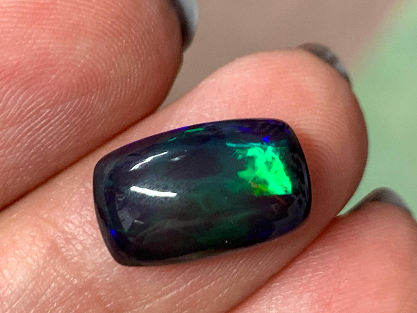 Natural Ethiopian Black Opal 9x14x5mm cabochon