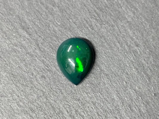 Black Ethiopian Opal pear 8x10x4mm cabochon