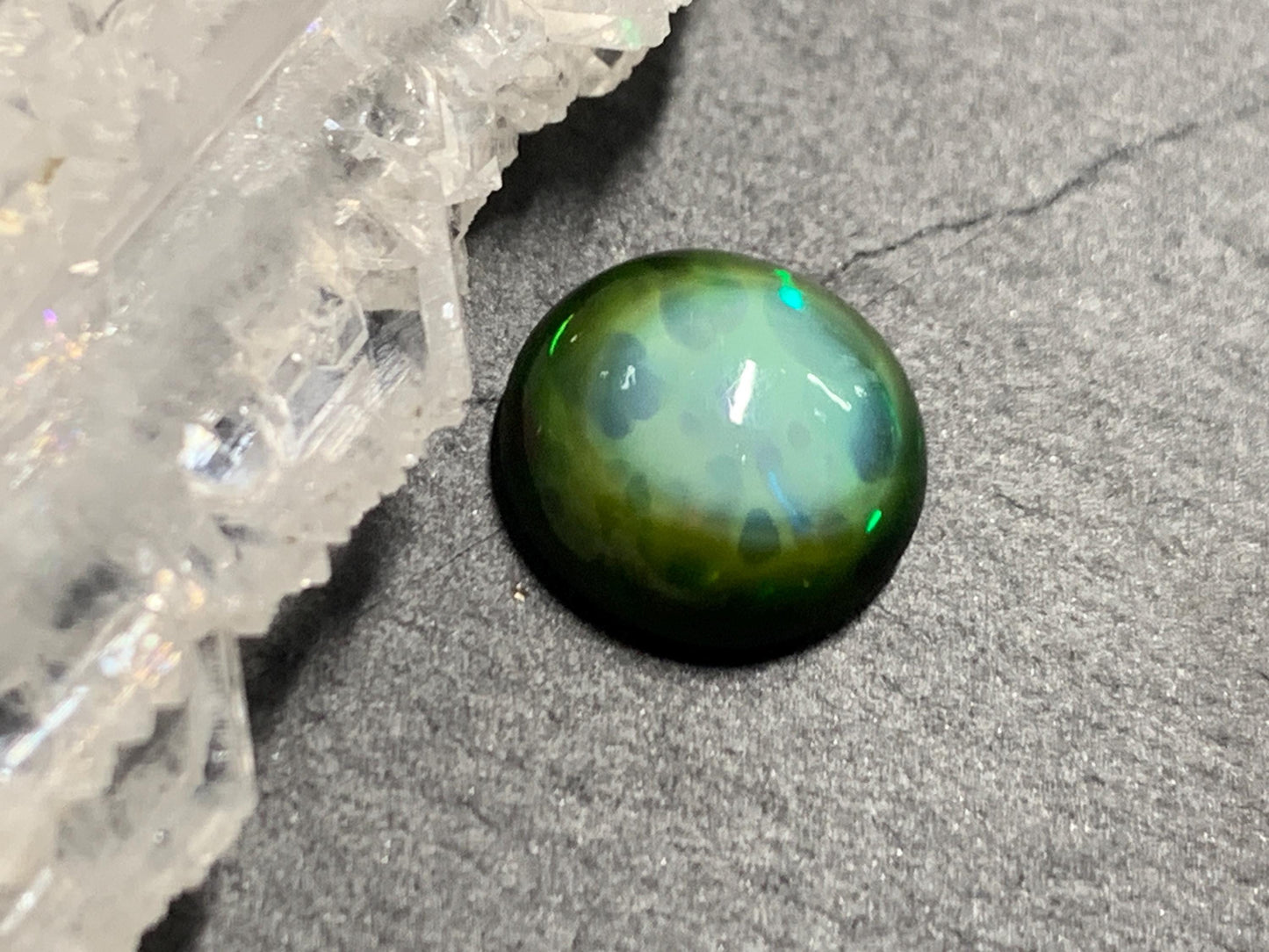Natural Black Ethiopian Opal round 9.5x9.5x4mm cabochon
