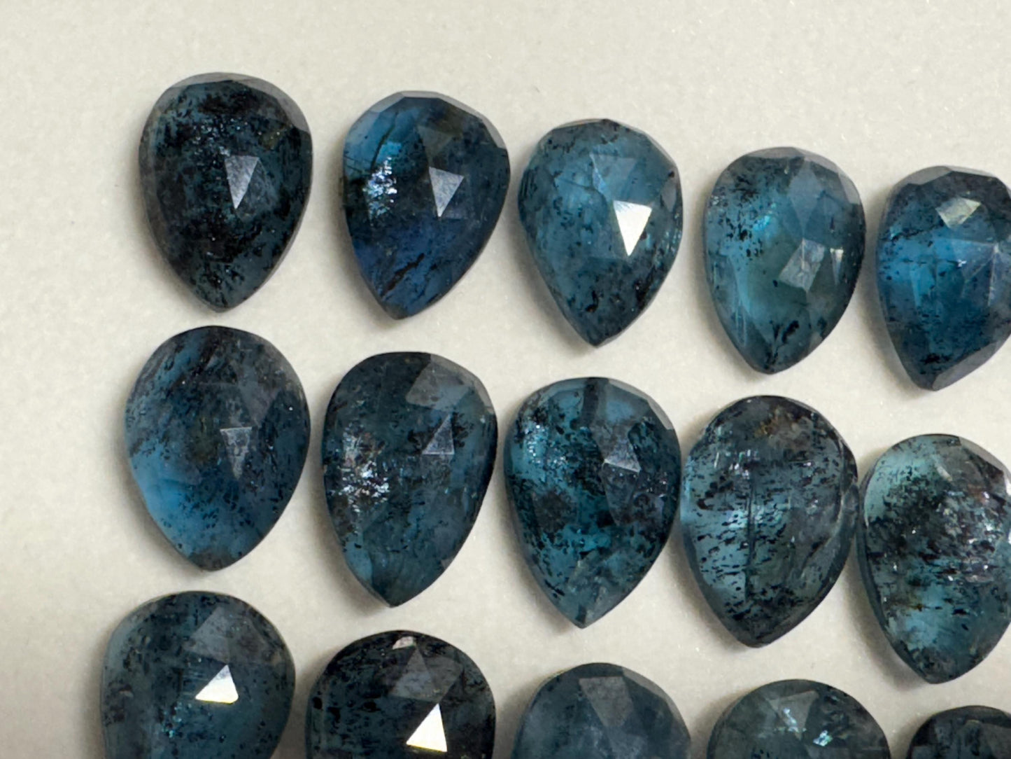 Faceted Moss Kyanite pear 10x14mm cabochon
