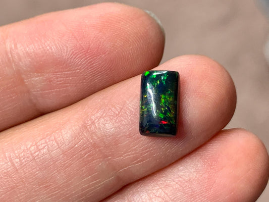 Black Ethiopian Opal rectangle 6x10x3mm cabochon