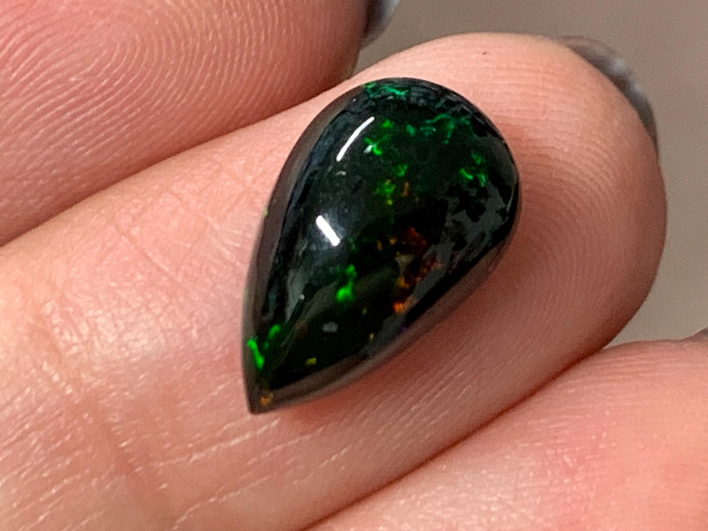 Natural Ethiopian Black Opal 8x14x6mm cabochon
