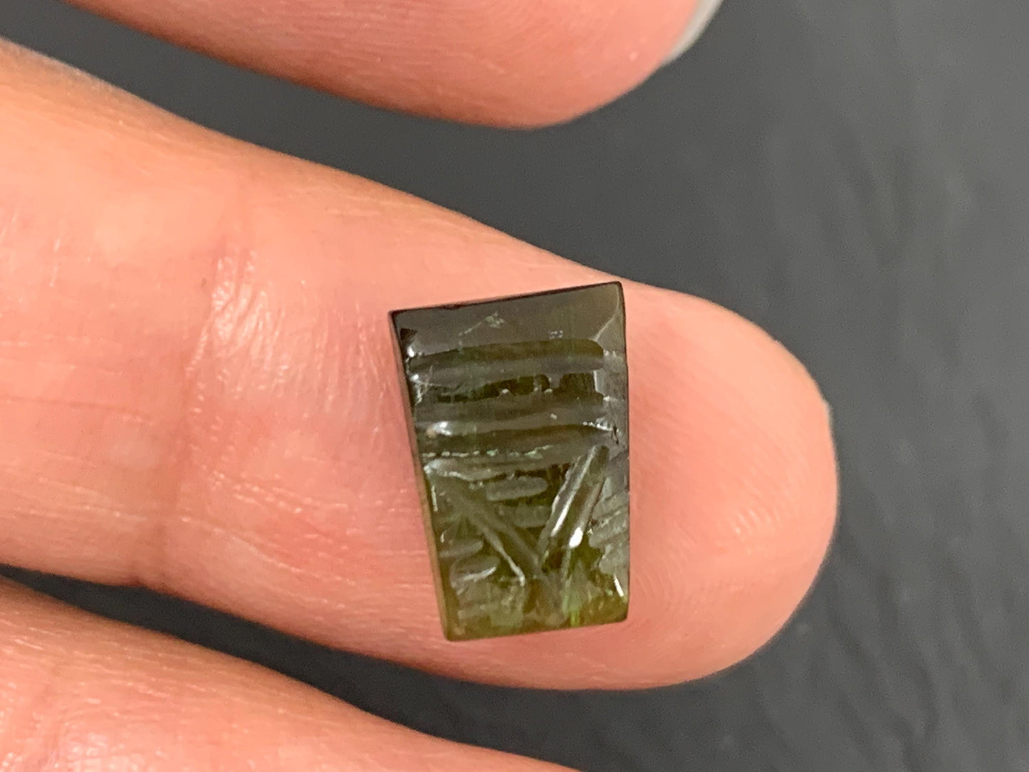 Carved Tourmaline 7x10x3mm cabochon
