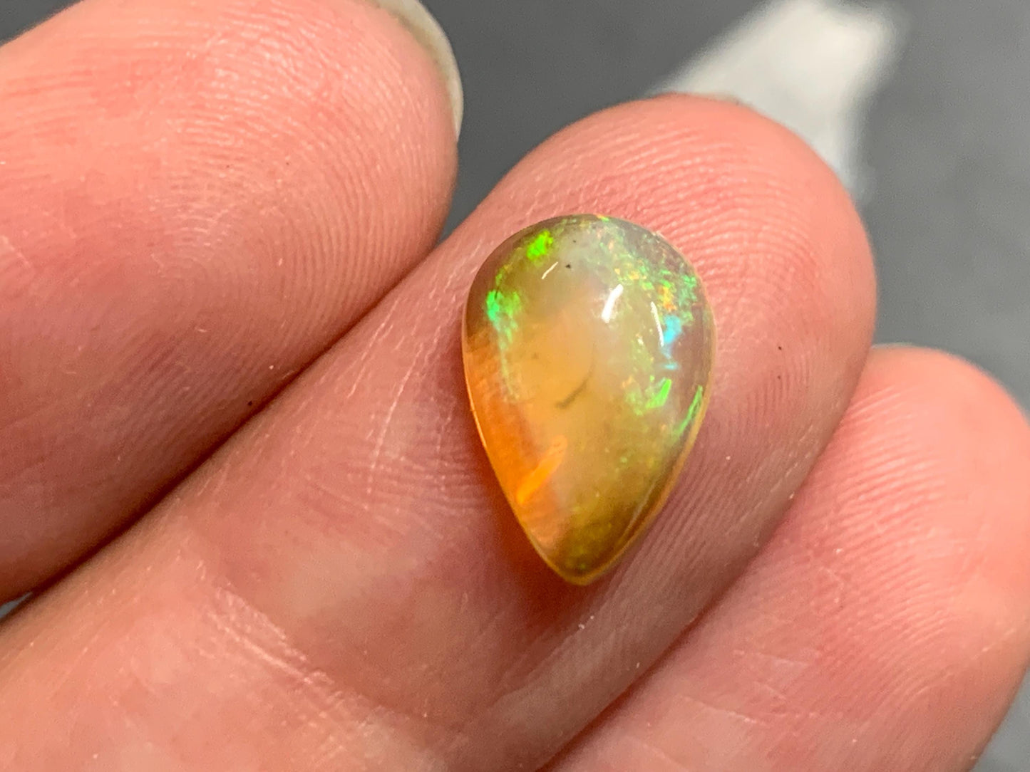 Natural Black Ethiopian Opal pear 8x11x5mm cabochon