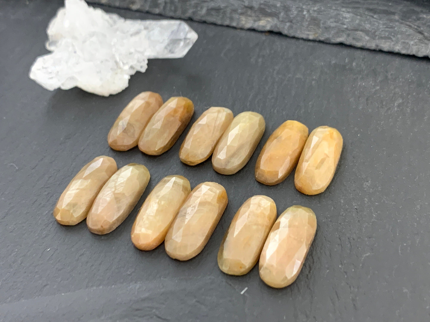 Pair of faceted Yellow Sapphire oval 8x20mm cabochon