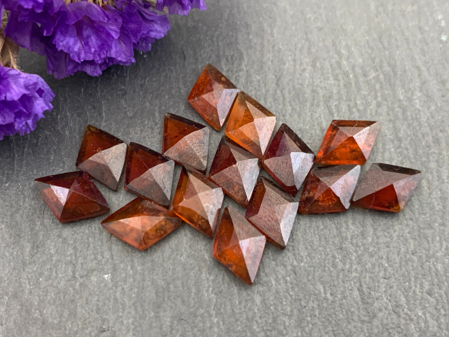 Faceted Hessonite Garnet rhombus 7x10mm cabochon
