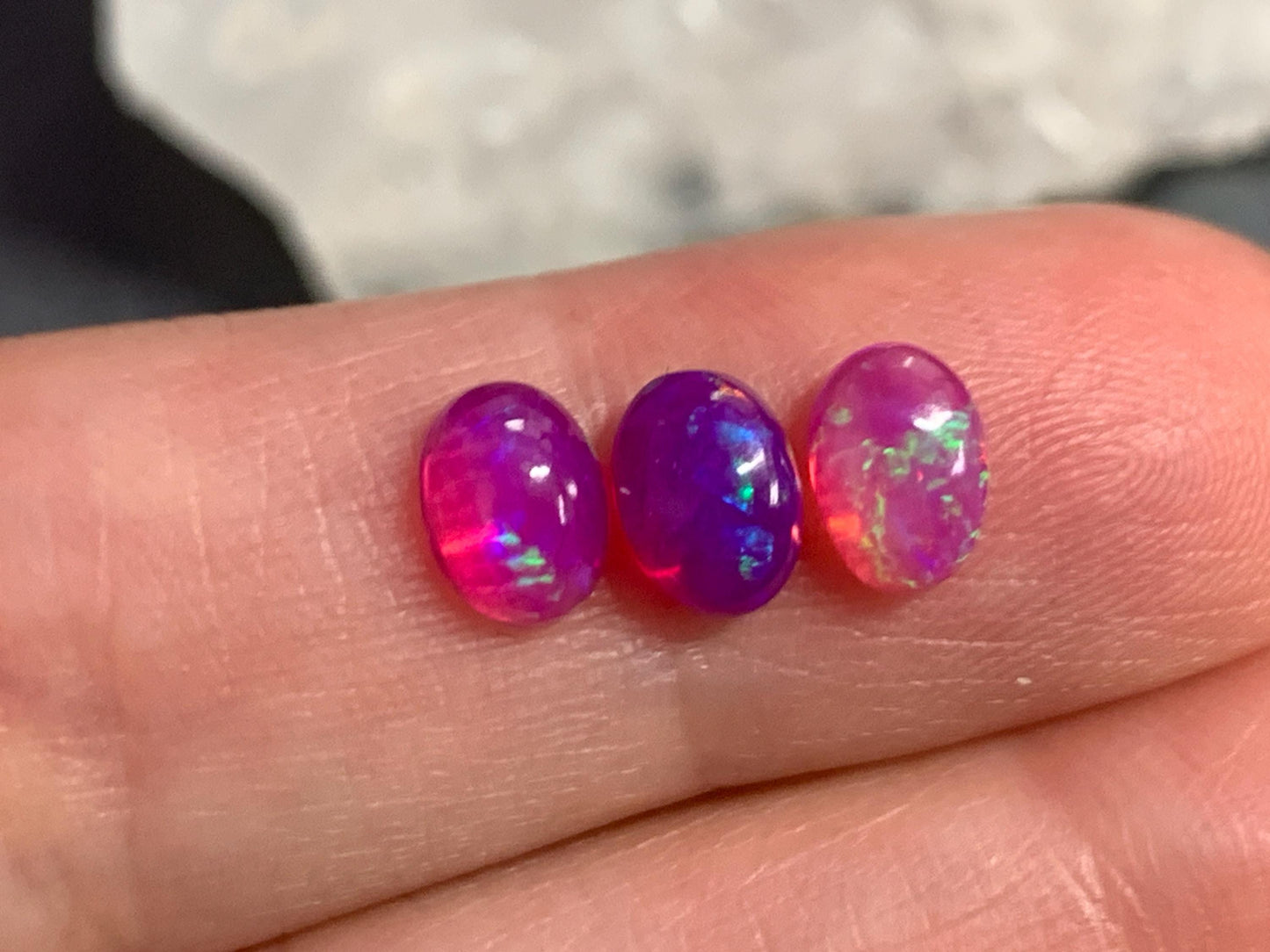 Ethiopian Opal oval 5x7mm cabochon - Natural Opal smoked to purple color