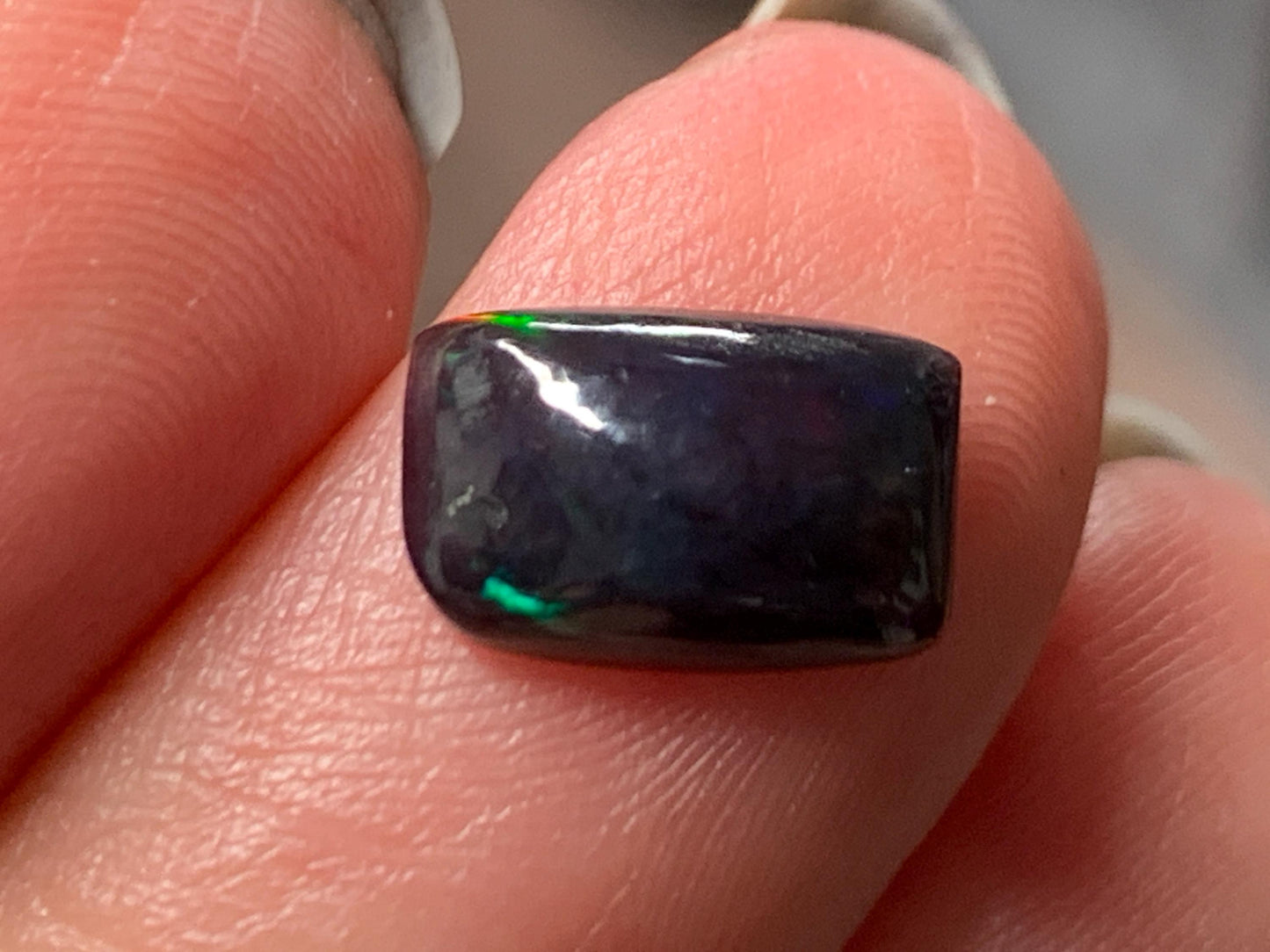 Natural Ethiopian Black Opal 6x10x3mm cabochon