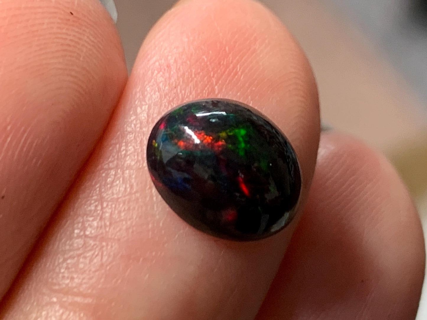 Natural Ethiopian Black Opal 8x10x4mm cabochon