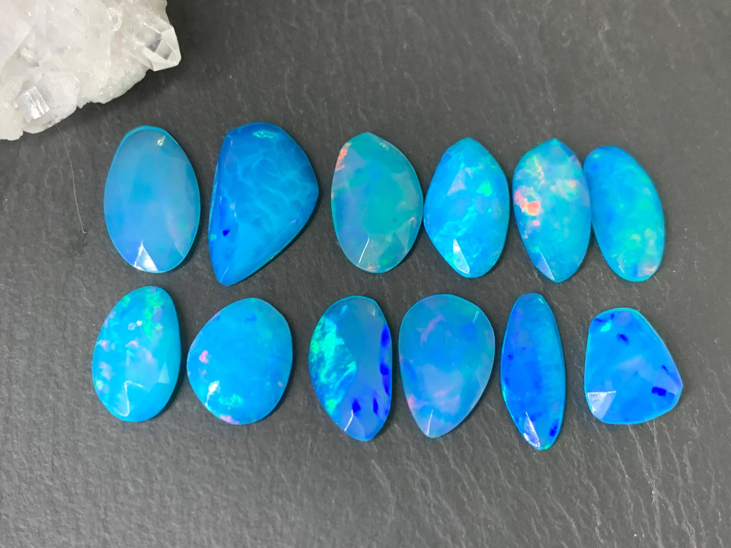 Faceted Blue Ethiopian Opal 11-16mm long cabochon