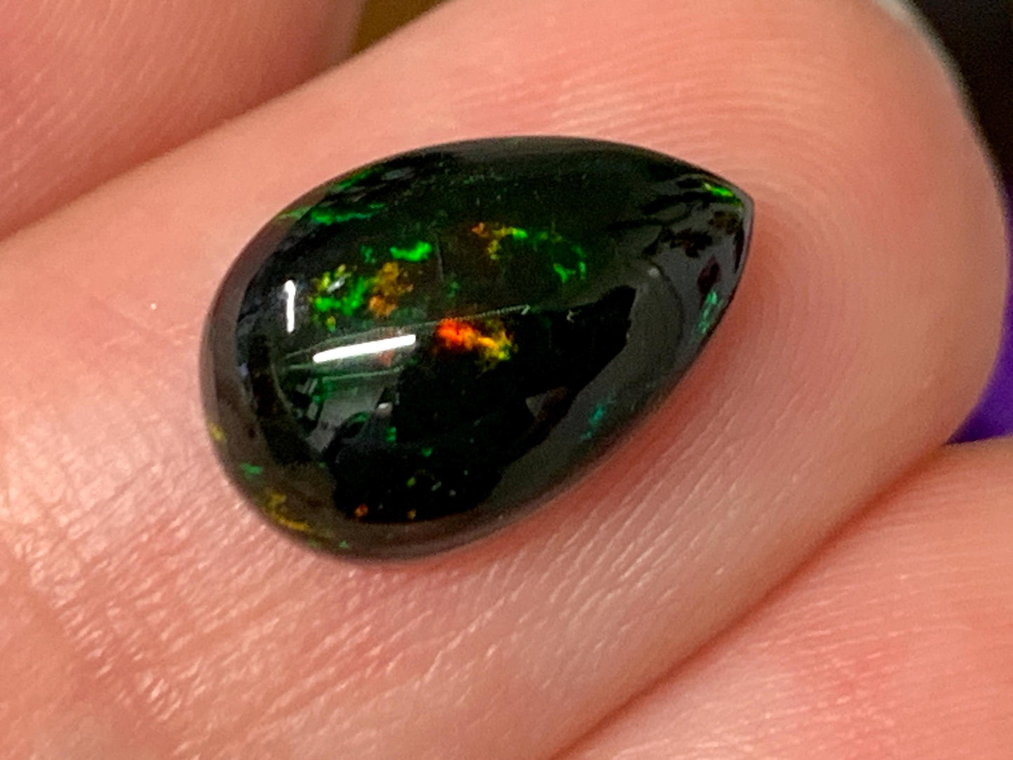 Natural Ethiopian Black Opal 8x12x4mm cabochon