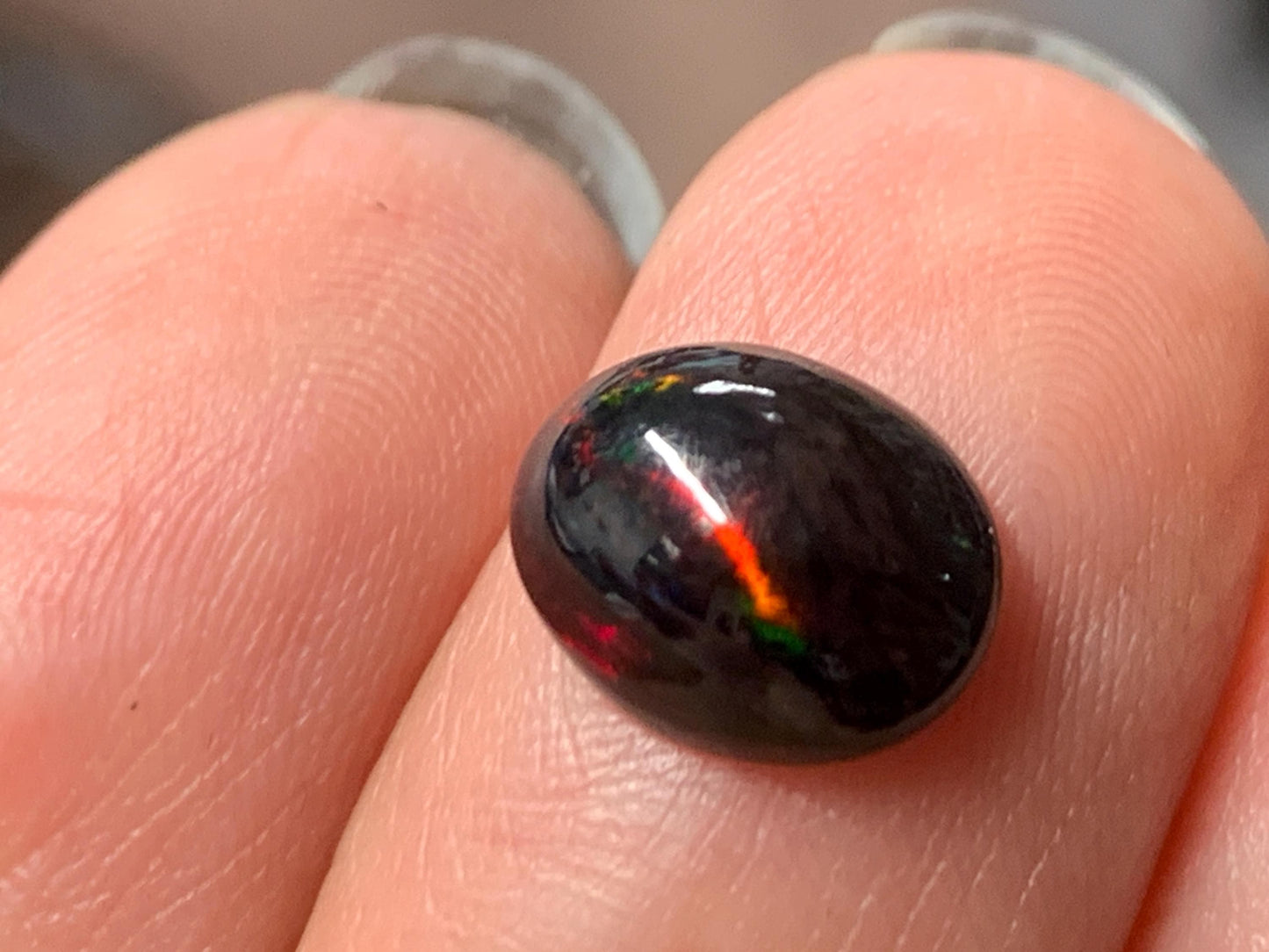 Natural Ethiopian Black Opal 8x10x4mm cabochon