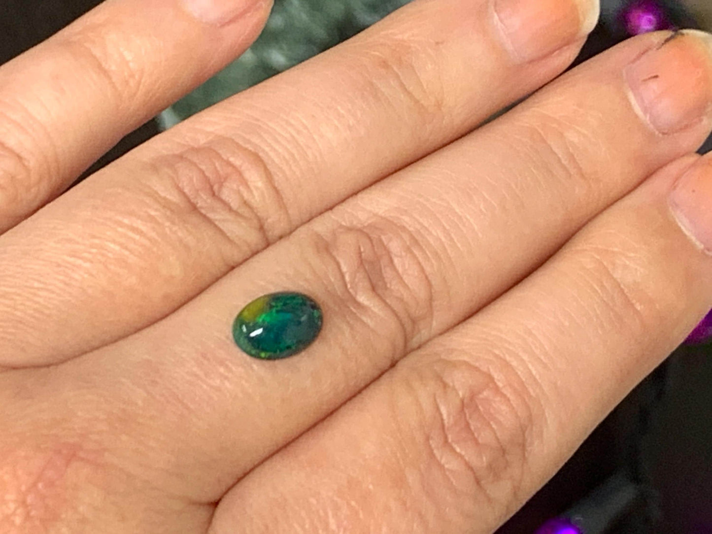 Natural Ethiopian Black Opal 6x9x3mm cabochon