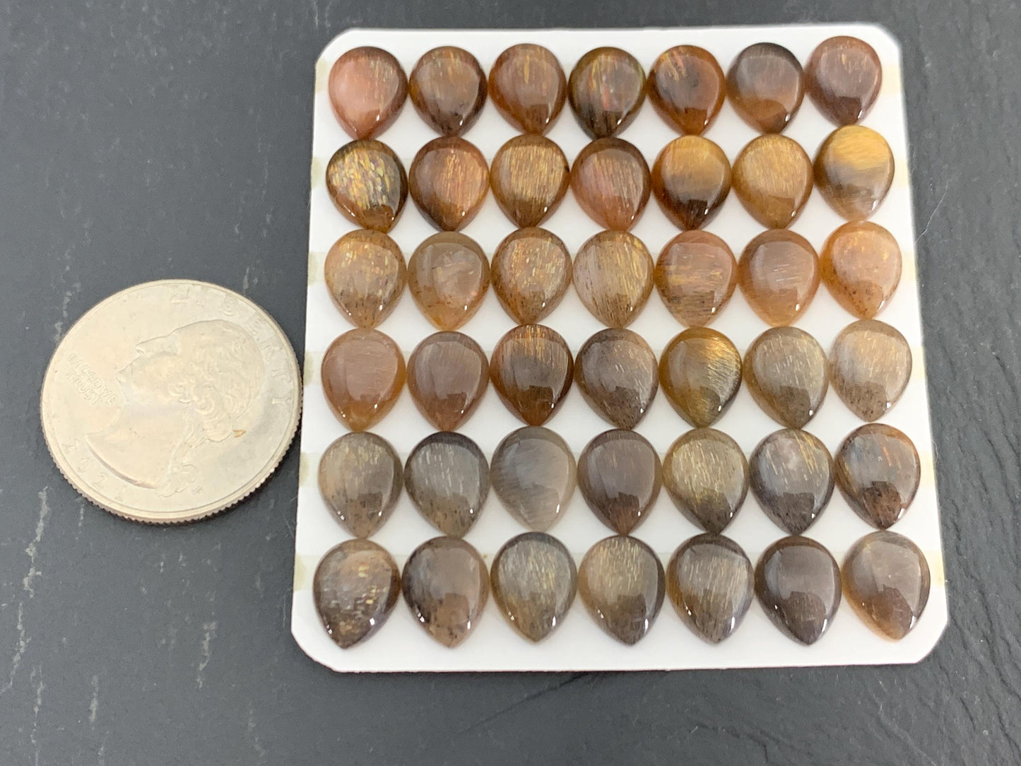 Gold Sunstone pear 8x10mm cabochon