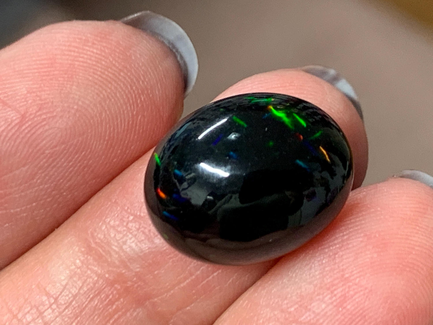 Natural Ethiopian Black Opal 13x16x5mm cabochon