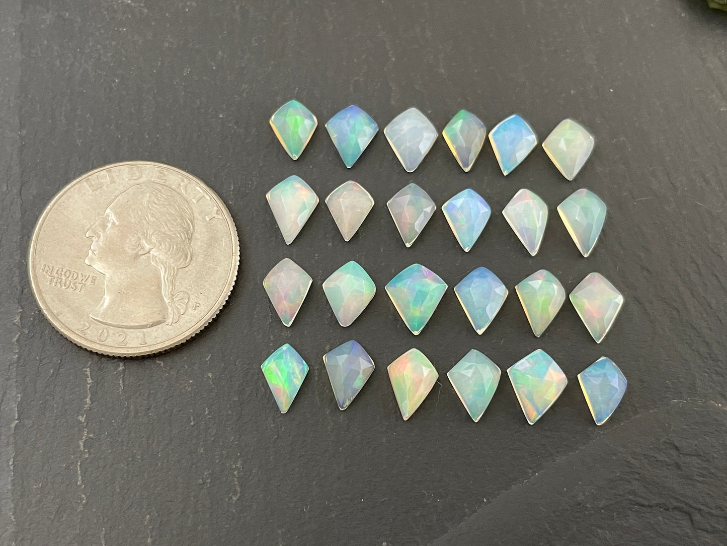 Faceted Ethiopian Opal kite 7-8mm long cabochon