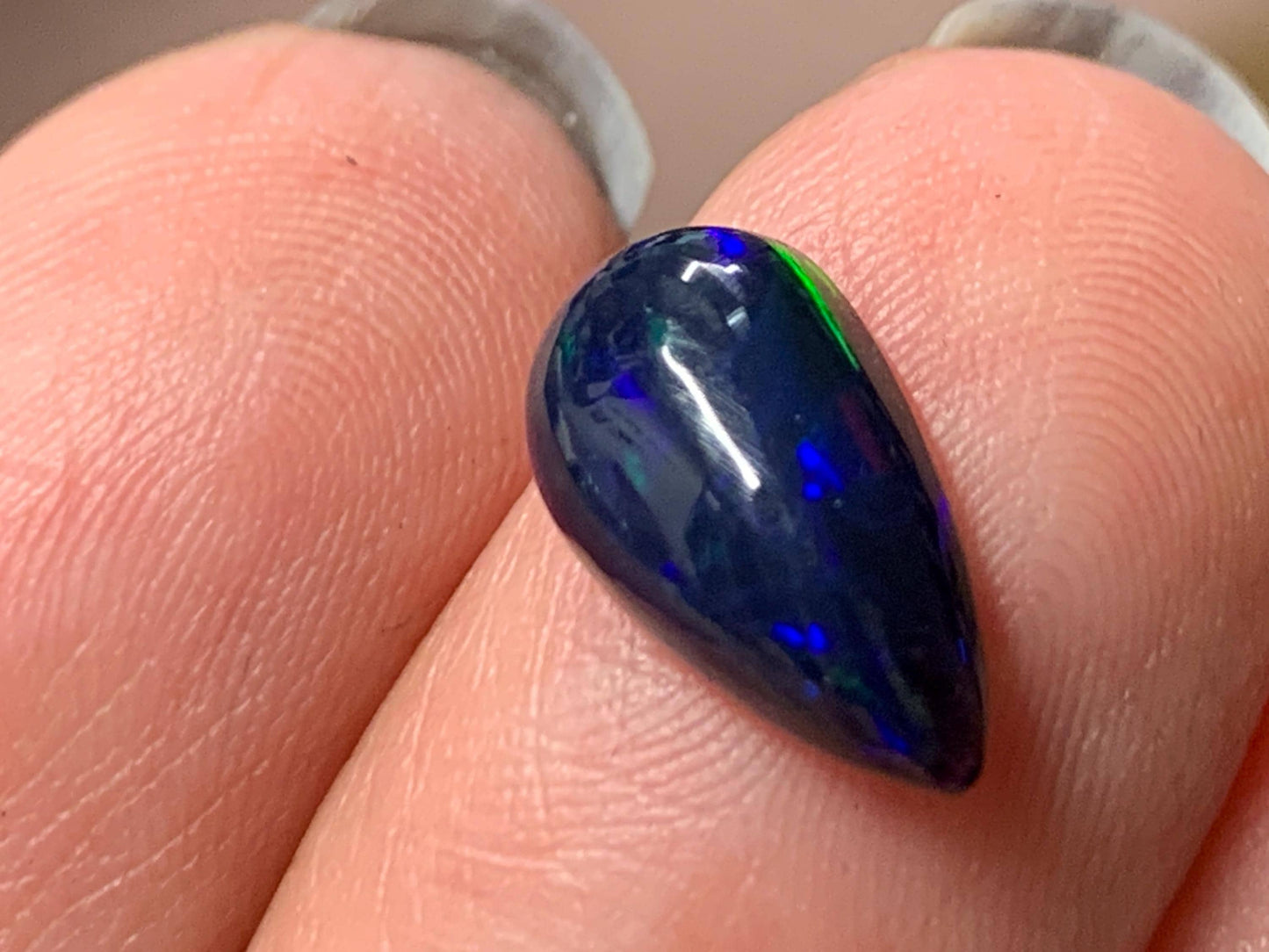 Natural Ethiopian Black Opal 7x12x4mm cabochon