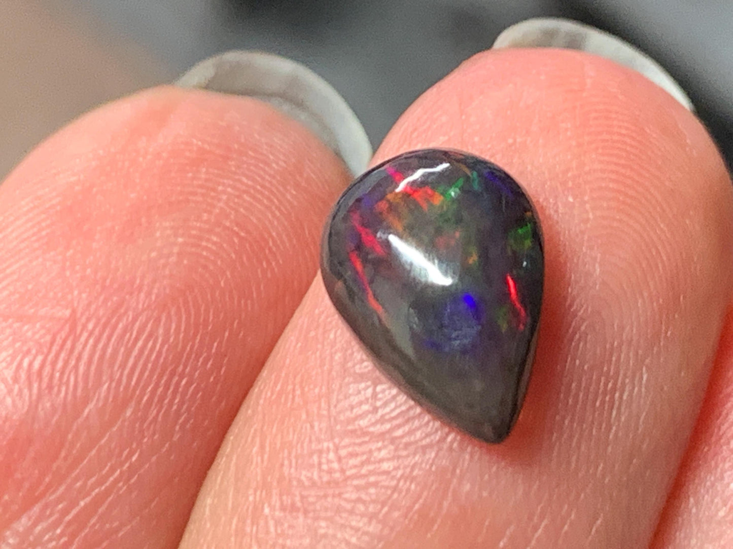 Natural Ethiopian Black Opal 7x11x4mm cabochon