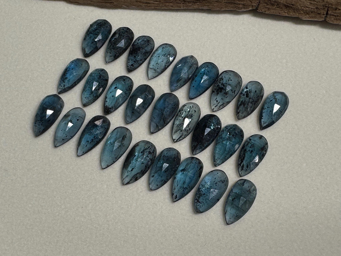 Faceted Moss Kyanite pear 7x15mm cabochon