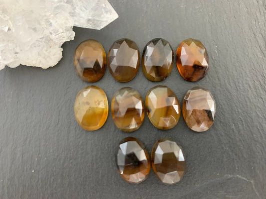 Faceted Montana Agate oval 10x14mm cabochon